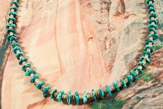 Beautiful Necklace featuring Genuine Kingman Turquoise and Penshell Heishi. Sterling Silver Clasp. Created by Santo Domingo Artist Carol Pacheco. The Santo Domingo Pueblo is in New Mexico, near Santa Fe.